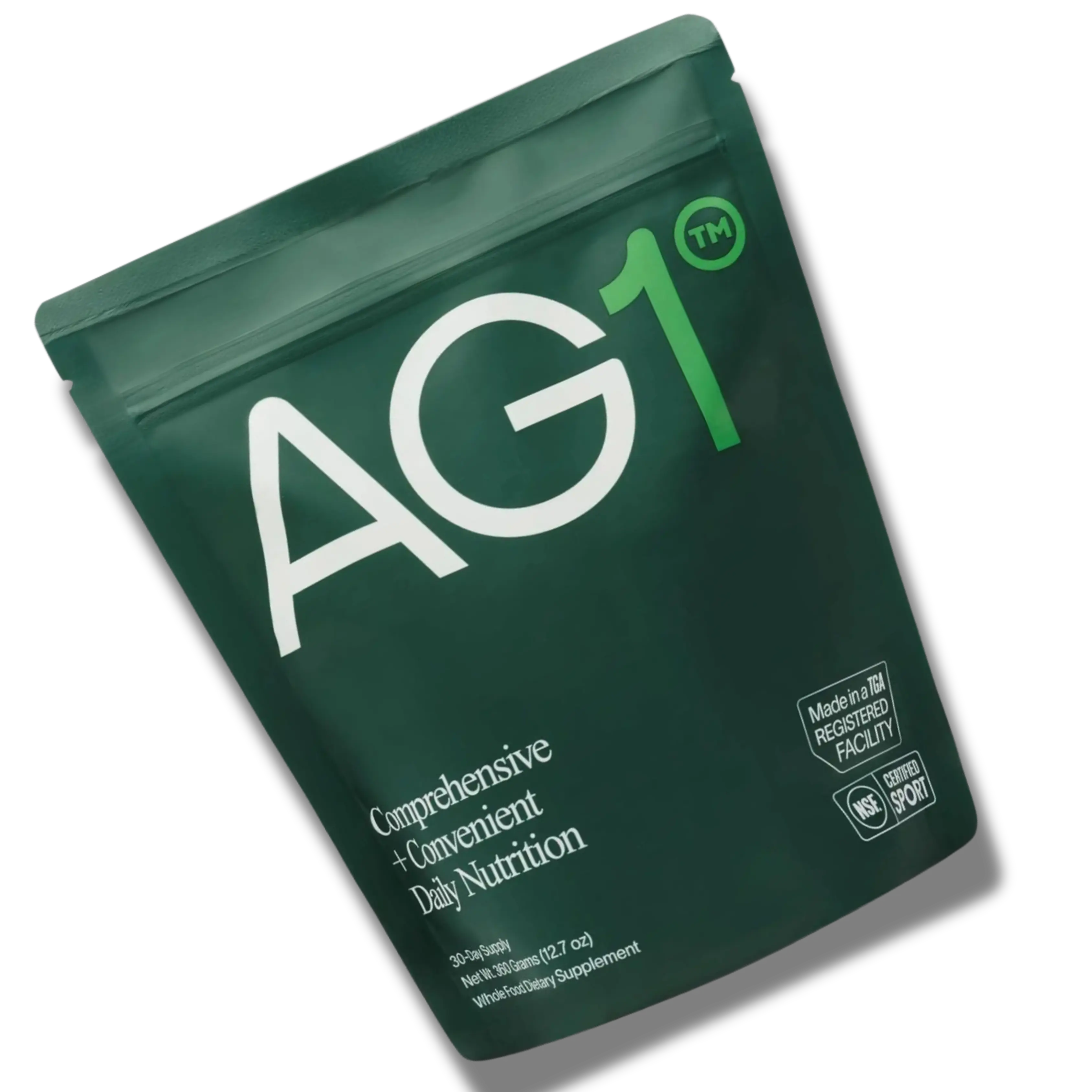 Green package of AG1 with branding and text on a white background