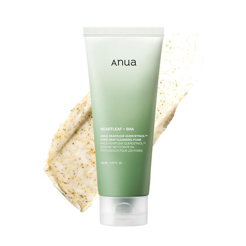 Green tube of anua skincare product with a scrub on a white background