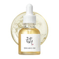 Skincare serum bottle with dropper on a white background