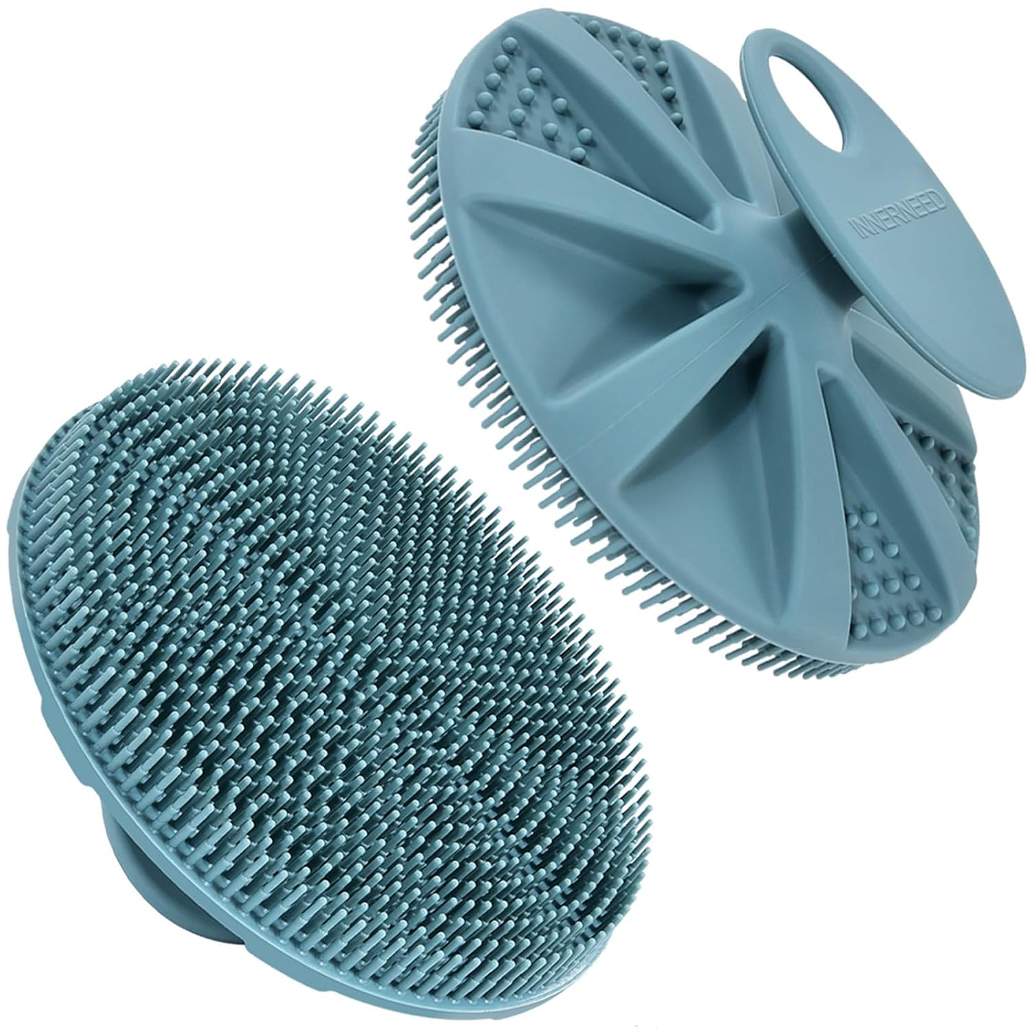 Two blue silicone scrubbers on a white background