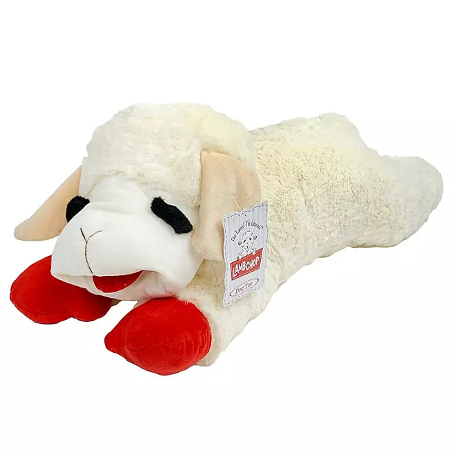 Plush toy sheep with red feet on a white background